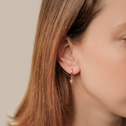 Crossed Fingers Huggie Earrings Sterling Silver