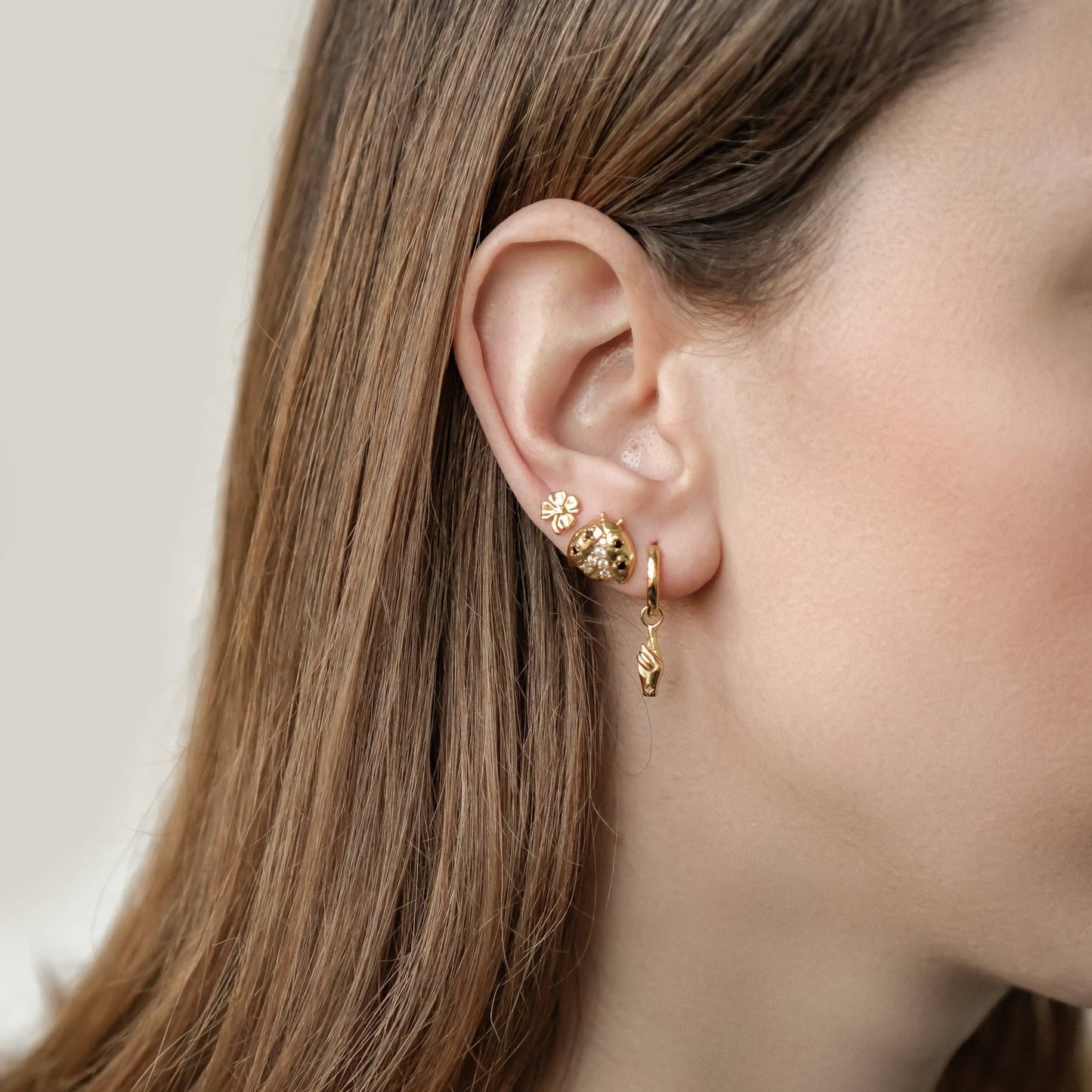 Crossed Fingers Huggie Earrings Sterling Silver