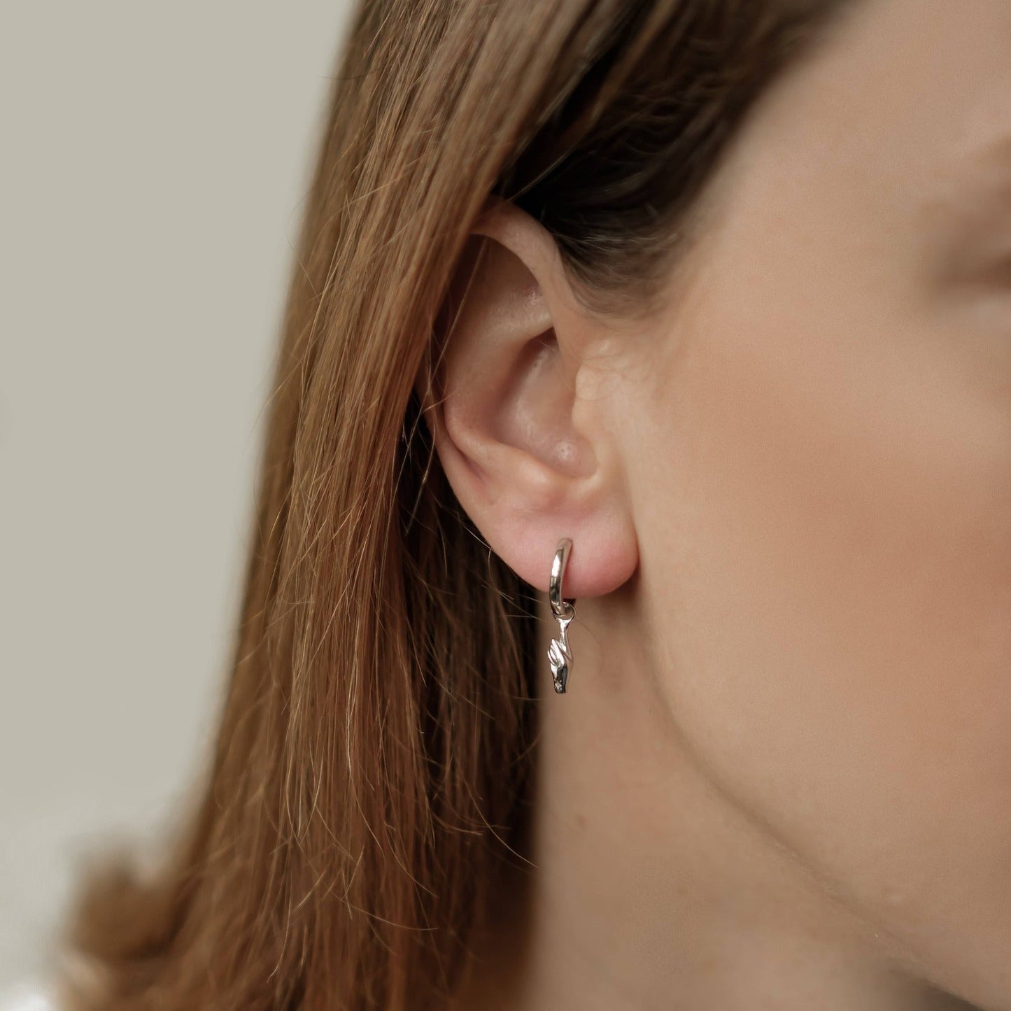 Crossed Fingers Huggie Earrings Sterling Silver