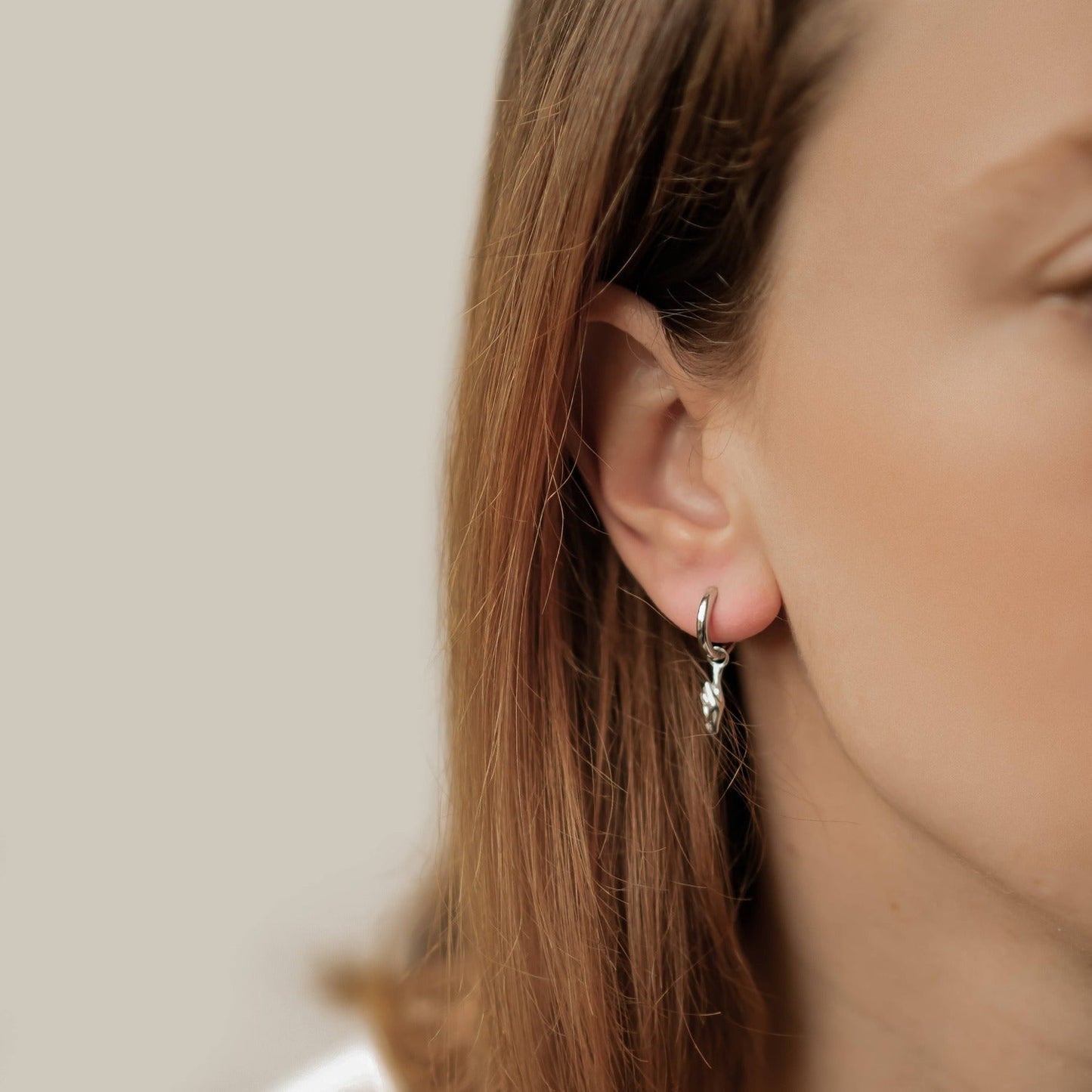 Crossed Fingers Huggie Earrings Sterling Silver