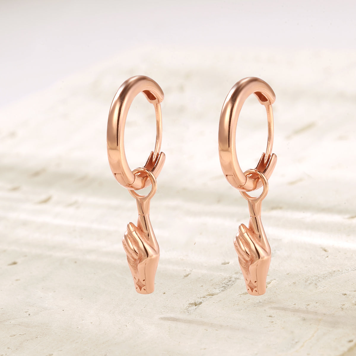 Crossed Fingers Huggie Earrings Sterling Silver